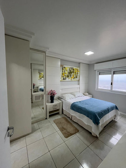 Capão da Canoa - Edifício Luiz Bassani / Apto 1103 com Vaga (2 Dorm)
