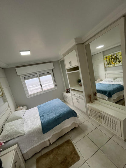 Capão da Canoa - Edifício Luiz Bassani / Apto 1103 com Vaga (2 Dorm)