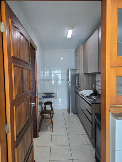 Capão da Canoa - Edifício Luiz Bassani / Apto 602 com Vaga (2 Dorm)