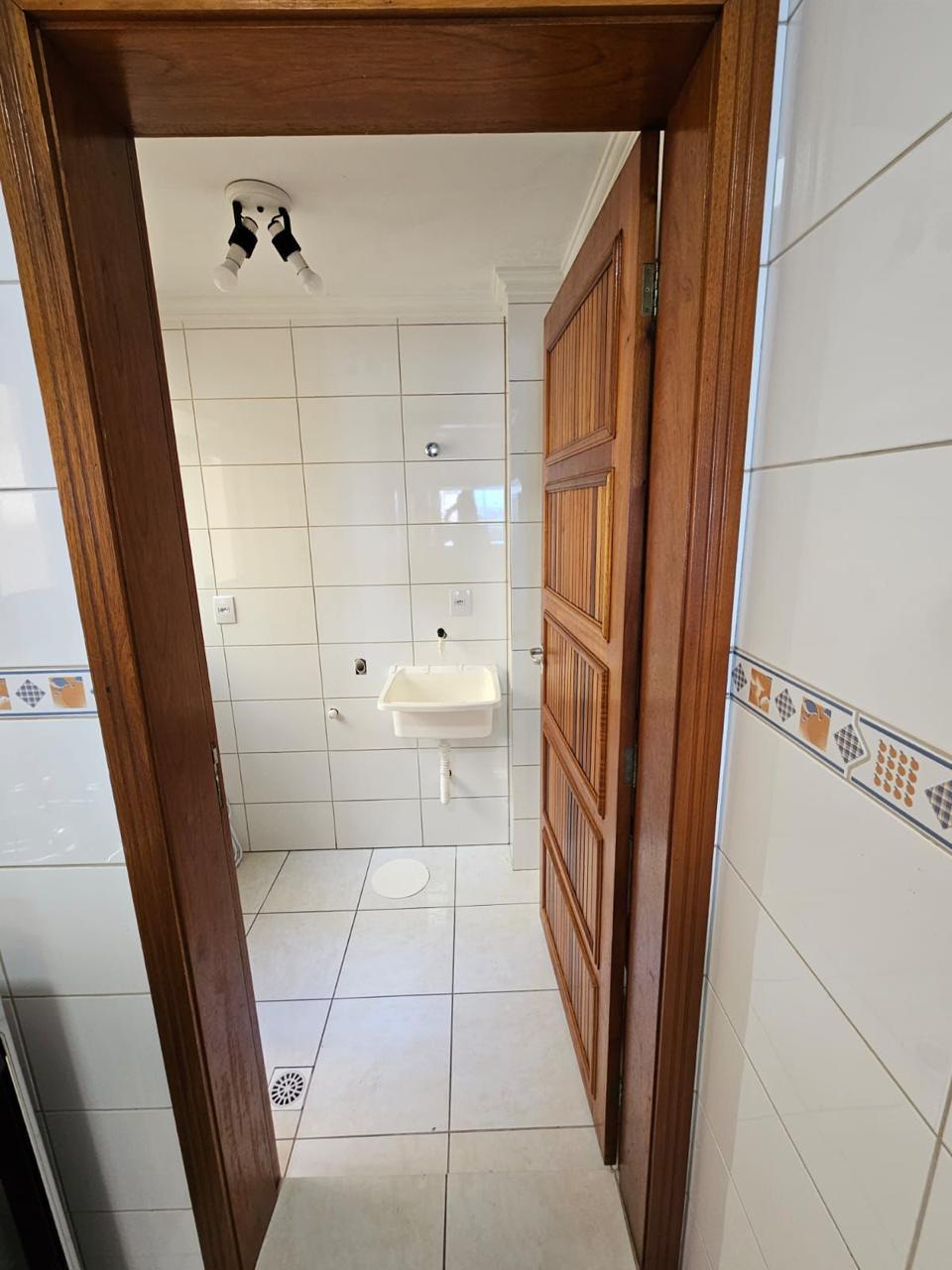 Capão da Canoa - Edifício Luiz Bassani / Apto 1106 com Vaga (2 Dorm)