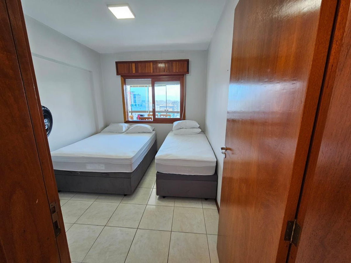 Capão da Canoa - Edifício Luiz Bassani / Apto 1106 com Vaga (2 Dorm)