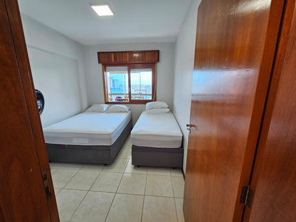 Capão da Canoa - Edifício Luiz Bassani / Apto 1106 com Vaga (2 Dorm)