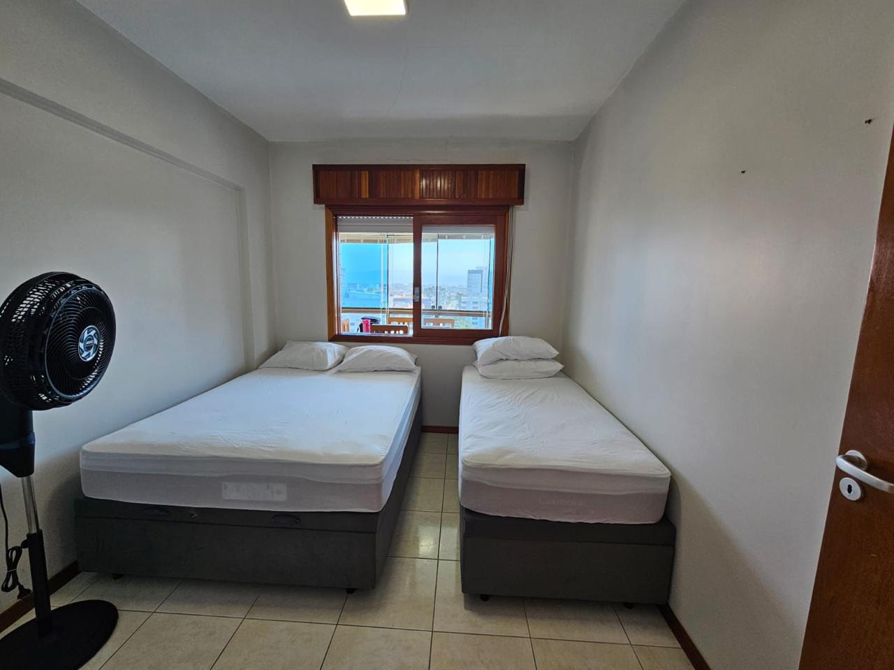 Capão da Canoa - Edifício Luiz Bassani / Apto 1106 com Vaga (2 Dorm)